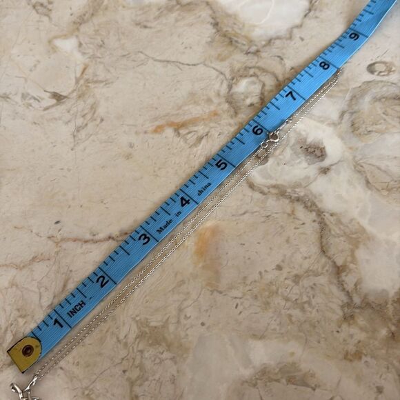 Tiffany & Co. Elsa Peretti Infinity Cross Small Sterling Silver - Picture 9 of 10